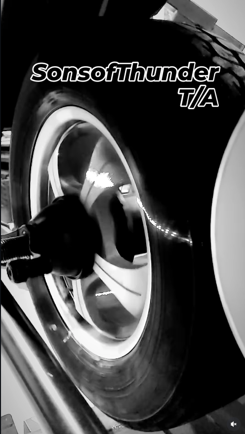 Professional tire balancing machine in action