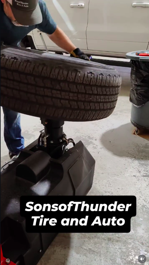 Professional tire machine in action